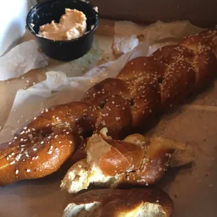 The pretzel half eaten