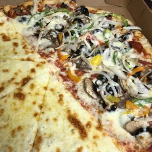 Half white pizza half Godfather Pizza