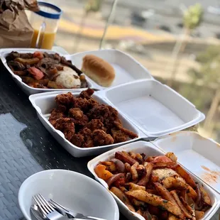 Lomo Saltado, Chicharron De Pollo, y Saltado De Mariscos