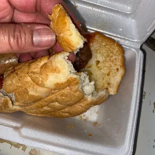 Hard bread and one Italian sausage link way too much hard bread that is not OK!