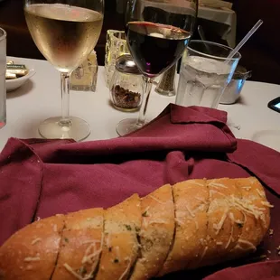 Garlic bread and wine.