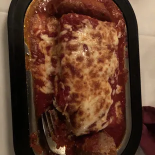 Lasagna with a sausage and meatball.   It was huge.