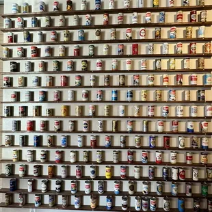 Wall of beer cans is impressive