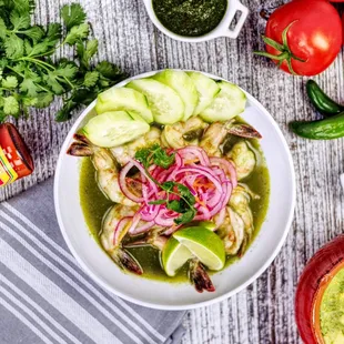 a bowl of shrimp and vegetables