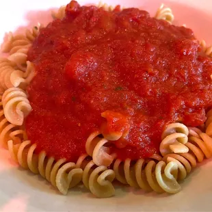 Whole wheat pasta with simple red sauce. Perfect for a summer dinner.