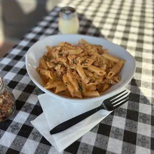 a plate of penne pasta