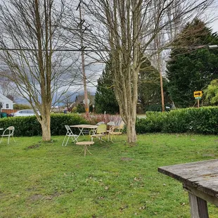 tables and chairs in a yard