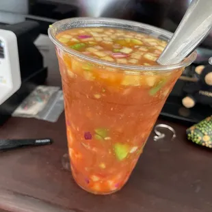 a drink in a plastic cup