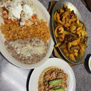 Order of 2 Tacos de Camaron, Chicken, Shrimp and Steak Fajitas, and a tostada de ceviche de Pescado