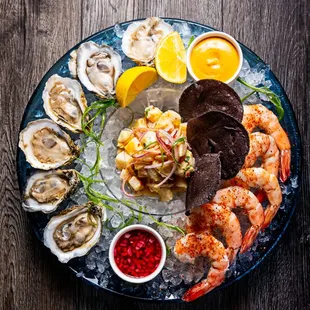 a platter of seafood and oysters