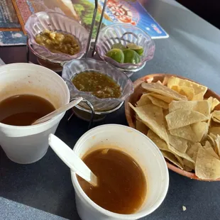 Chips and salsa with seafood consume