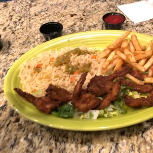 Fried shrimp, fries, dry rice.