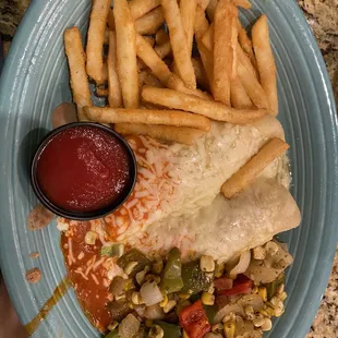 Chicken enchilada, Christmas style, with veggies and French fries as substitute sides for rice and beans.