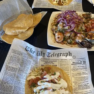 Tostada Loca and fish tacos