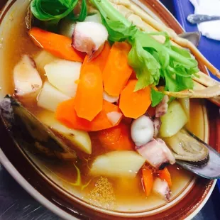 a bowl of seafood soup