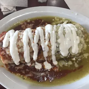Carne Asada burrito mojado, half red and half green sauce! Delicious!!