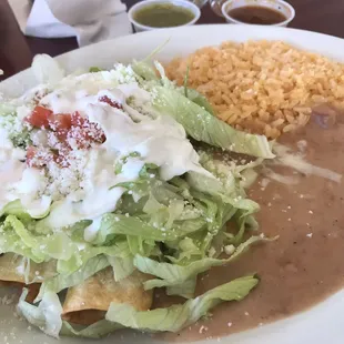 Flautas, one shredded beef, one grilled chicken. Both were delicious. Tried both the red and green sauce and loved them both equally!