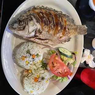 a plate of rice and vegetables