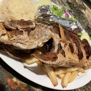 a plate of fish and french fries