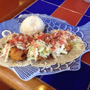 Shrimp tacos, perfectly fried and delicious. Highly recommend!!