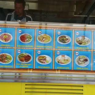 a man behind a food truck