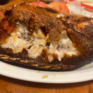a whole fish on a plate
