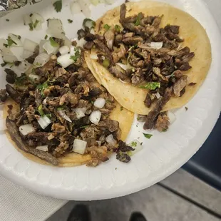 Dry meat, tortillas could've cooked a lil more and where's the cilantro?