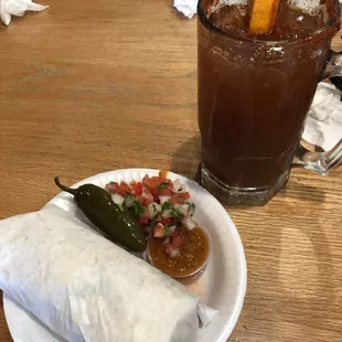 Shrimp burrito with Modelo michelada