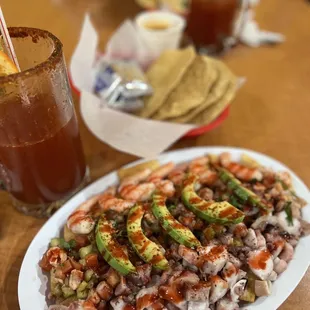 a plate of food and a drink