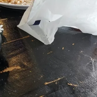 The table was soo dirty that I couldn&apos;t pick up the napkin without tearing it!