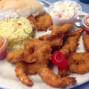Fried shrimp with rice &amp; pineapple coleslaw. Generous portion &amp; delicious.