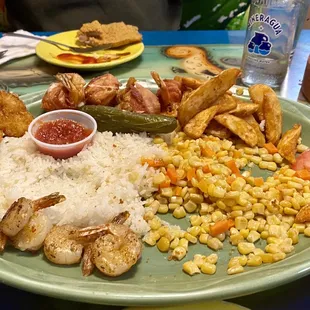 Notice how we both ate all the FISH first. Super crispy fine cornmeal crust makes it. buttery rice &amp; corn is heavenly :)...