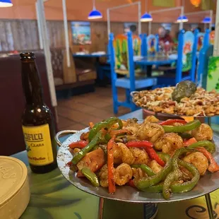 Shrimp frajita and beef, bacon, onions and shrimp with white cheese.