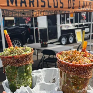 Green ceviche cup and red ceviche cup