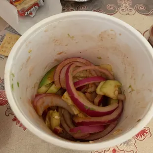 Aguachile .. more like onionchile  about 4 maybe 5 shrimps in there