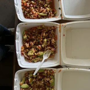 four containers of food