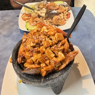 two mixed seafood plates