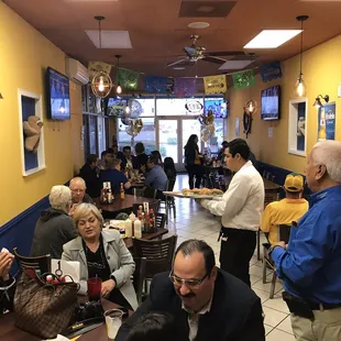 eople eating at a restaurant