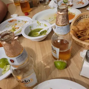 a table full of food and drinks