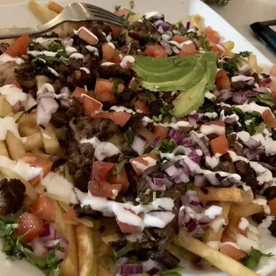 Carne asad fries ! Good size portion for under $10! Photo by Harvey-Harv
