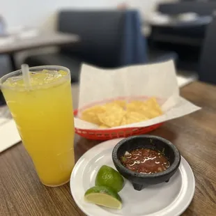 Chips and salsa and Pineapple Agua Fresca