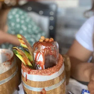 a close up of a drink in a barrel