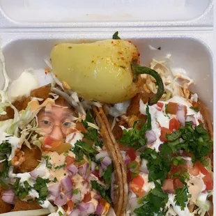 mexican food in a styrofoam container