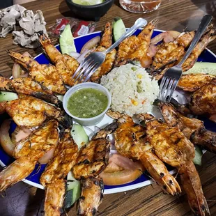 a plate of grilled shrimp
