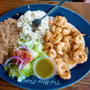 Shrimp Al mojo de Ajo with rice, beans, &amp; a small salad to the side