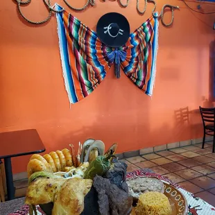 Molcajete mixto , chicken, shrimps, steak and special sauce and homemade tortillas.