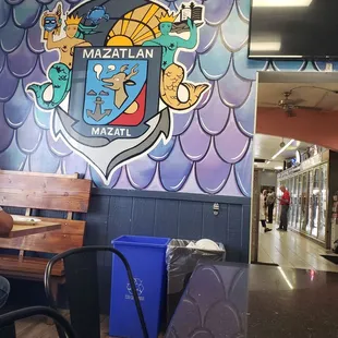 a mural of a coat of arms