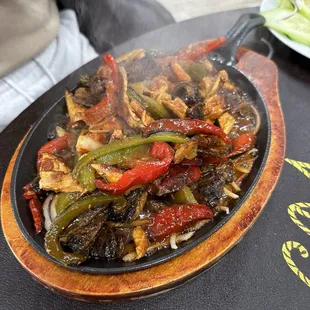 Steaming Carne Fajitas with vegetables