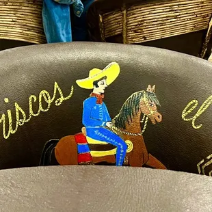 a cowboy riding a horse