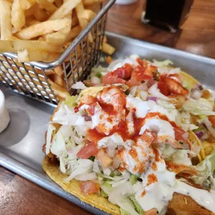 One shrimp and one fish taco with basket of fries: $14